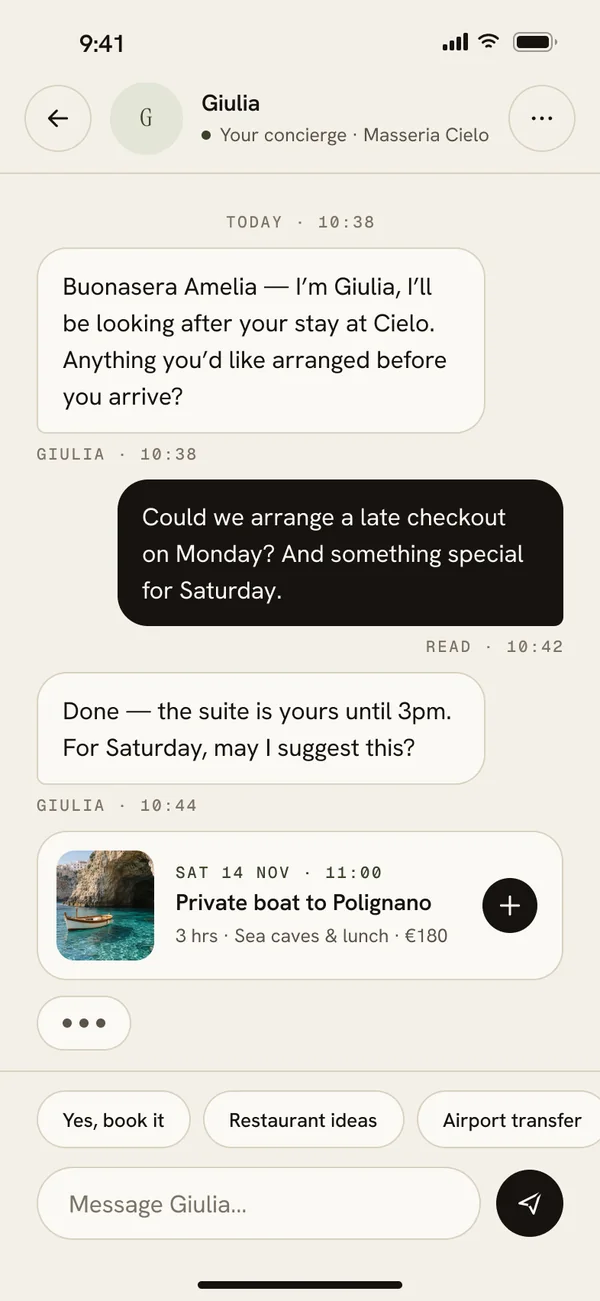 Concierge chat with Giulia arranging a late checkout and a private boat to Polignano